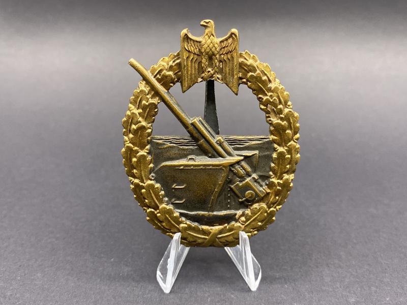 Denazified C.E.Juncker Berlin Coastal Artillery Badge